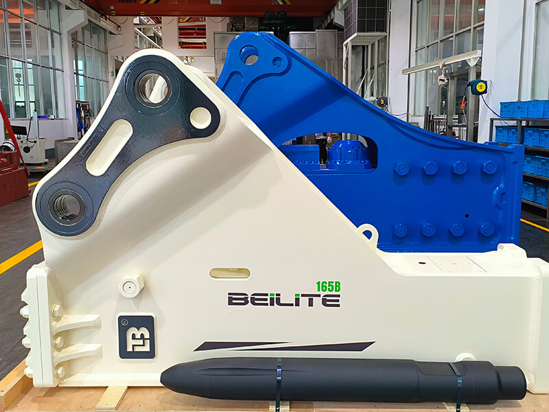 large-white-hydraulic-breaker-lying-flat
