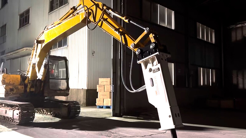 small-white-hydraulic-breaker-mounted-on-a-vehicle